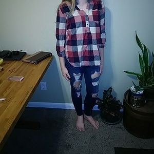 Ripped jeans and plad shirt